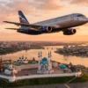 Пассажирский самолёт над Казанью в вечернем свете